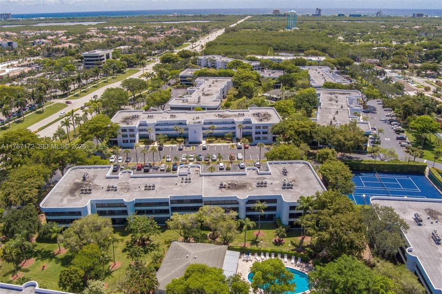 Welcome to Sheridan By The Beach, a gated community, This property boasts an impressive view of the pool, ceramic tiles throughout, brand new carpet in the main Bedroom, freshly painted walls & baseboards, 3 Key West Style Ceiling Fans. AC 2 years old & HWH 2020, kitchen features a new range & fluorescent light diffuser panels have been replaced in kitchen & bathrooms. New accordion shutters on front windows, washer & dryer in the unit, maintenance fees cover cable TV & one premium channel. Residents can enjoy amenities such as 2 heated swimming pools, 2 clubhouses, gym, BBQ areas & tennis/pickleball courts. All necessary inspections & maintenance work have been completed, no special assessments.  Close to Hollywood Beach & Broadwalk.