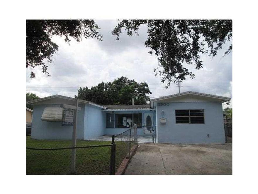 REDUCED! Location! down the street from the Multi Million Dollar Hard Rock Hotel and Casino! Convenience! Minutes from the Turnpike, I-595 & 95! This home has great potential to be the house of your dreams. It features a lard yard which is big enough for  a pool, a stacked bedroom floorplan with spacious rooms, a very large & open family area, huge kitchen , a den which can be used as a bedroom, office, playroom, etc! NO HOA! Limitless Potential! This is a Fannie Mae Homepath Property!