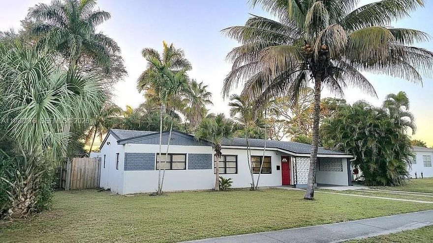 Move-in ready pool home with a huge backyard in the heart of Fort Lauderdale! Welcome to 521 E Evanston Cir, a beautifully updated 4-bedroom, 2-bath home offering approximately 1,688 sq ft of living space on an oversized 10,000+ sq ft lot. The bright open floor plan creates a seamless flow between the living, dining, and kitchen areas, making the home ideal for both everyday living and entertaining. Step outside to your private tropical retreat featuring a large patio, beautifully tiled pool, and expansive backyard with plenty of space for gatherings, outdoor dining, or relaxing in the Florida sunshine. Conveniently located just minutes from major highways, shopping, dining, parks, and Fort Lauderdale’s world-famous beaches, this home offers the perfect combination of location, outdoor living, and modern comfort.