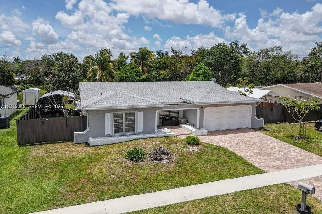 Photo of 8830 NW 3rd St, Pembroke Pines, FL 33024 (MLS # A12013040)