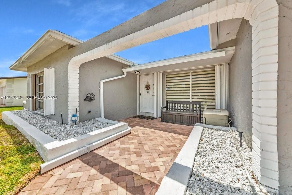 Photo of 8830 NW 3rd St, Pembroke Pines, FL 33024 (MLS # A12013040)