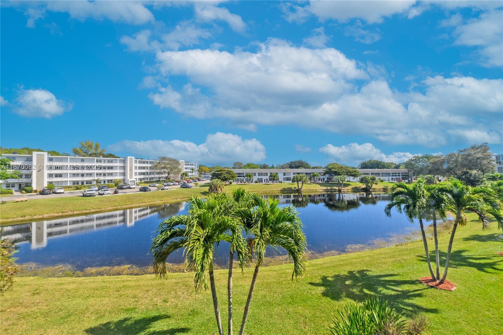 EVER THOUGHT OF BUYING A CONDO THAT NEEDS NO WORK OR REPAIRS? EVER DREAMT OF ENJOYING YOUR EVENING WITH A GORGEOUS WATER VIEW FROM YOUR BACK PORCH? LOOK NO FURTHER. THIRD FLOOR, WATER VIEW, TWO BEDROOMS WITH TWO FULL BATHS TASTEFULLY REMODELED WITH AN ENTERTAINING OPEN KITCHEN. BRIGHT TILES THROUGHOUT GIVE THE CONDO A WARM RELAXING AND SPACIOUS FEEL. HURRICANE IMPACT WINDOWS AND DOOR. LAUNDRY ROOM ON EACH FLOOR AND THIS ONE IS NEXT TO THE UNIT. YOUR RESERVED PARKING IS IN FRONT OF YOUR OWN CONDO. CENTURY VILLAGE HAS ALL THE AMENITIES ONE COULD HOPE FOR: STATE OF THE ART THEATER WITH 1700 SEATS, FITNESS CENTER, BREAKFAST & LUNCH CAFE, INDOOR & OUTDOOR POOLS, TENNIS COURTS, GAMES AND CARD ROOMS, PICKLE BALL, COURTESY SHUTTLE BUS TO AND FROM SUPERMARKETS, MALL AND THE BEACH AND SO MUCH MORE.