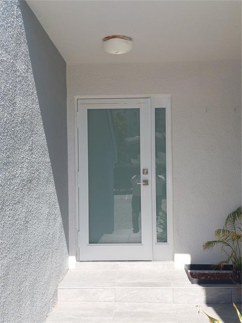 Photo of 255 Poinciana Dr #605, Sunny Isles Beach, FL 33160 (MLS # A11909821)