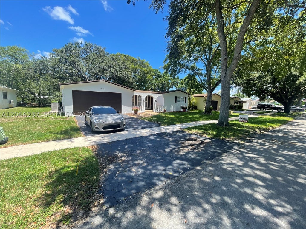 Photo of 9301 SW 54th St, Cooper City, FL 33328 (MLS # A12066237)