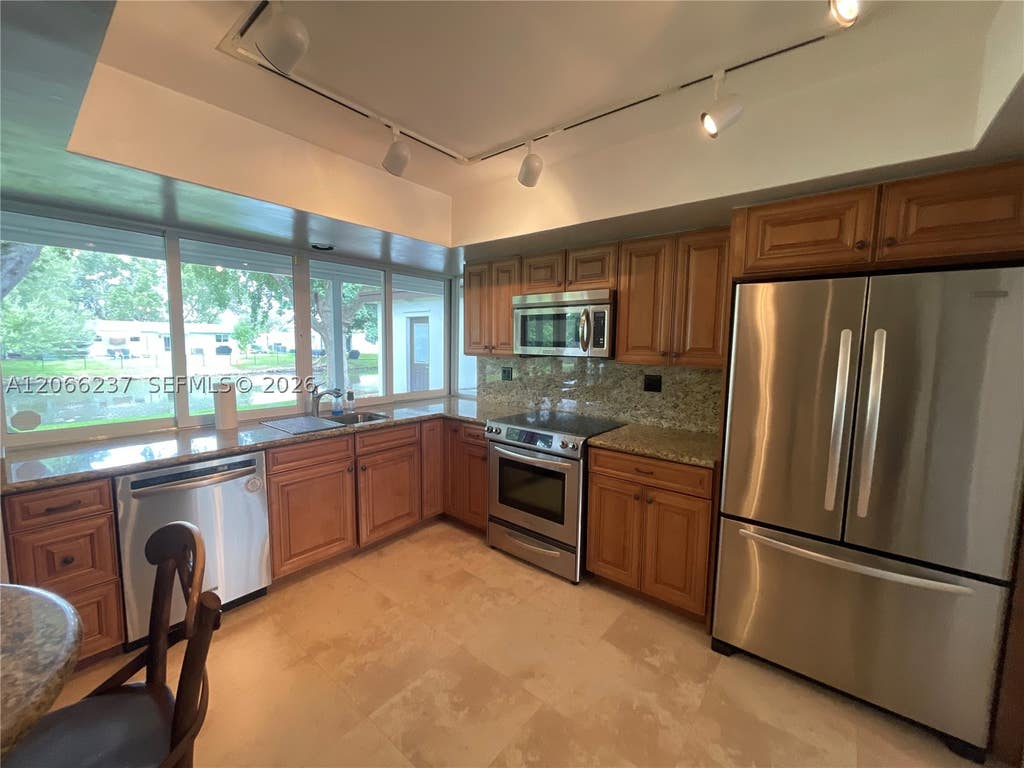 Photo of 9301 SW 54th St, Cooper City, FL 33328 (MLS # A12066237)
