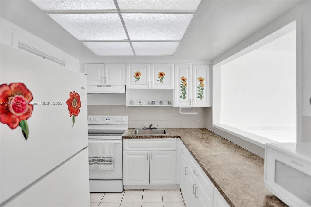 Photo of 1200 Hillcrest Ct #104, Hollywood, FL 33021 (MLS # A11347237)