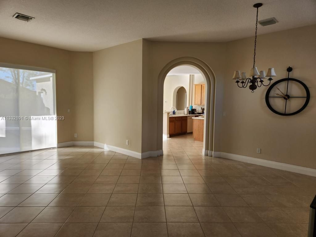 Photo of 1426 SW Malaga Ave, Port Saint Lucie, FL 34953 (MLS # A11332891)