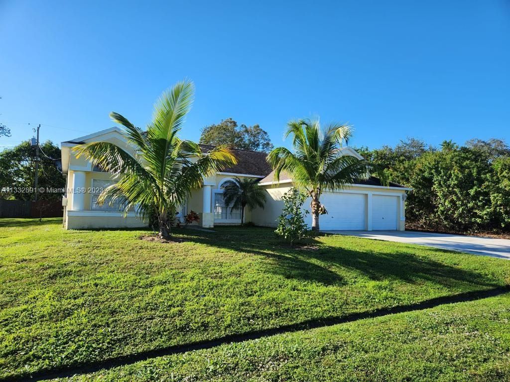 Photo of 1426 SW Malaga Ave, Port Saint Lucie, FL 34953 (MLS # A11332891)
