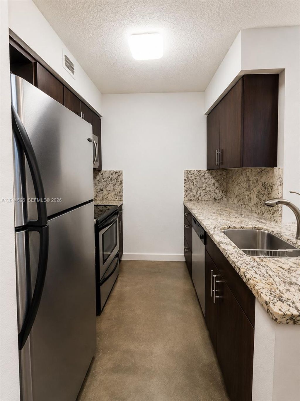 Photo of 2890 N Oakland Forest Dr #203, Oakland Park, FL 33309 (MLS # A12014596)