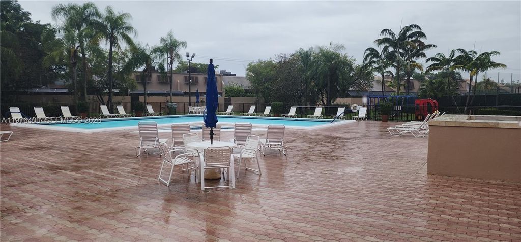 Photo of 12305 NW 11 Ct #12305, Pembroke Pines, FL 33026 (MLS # A11976400)