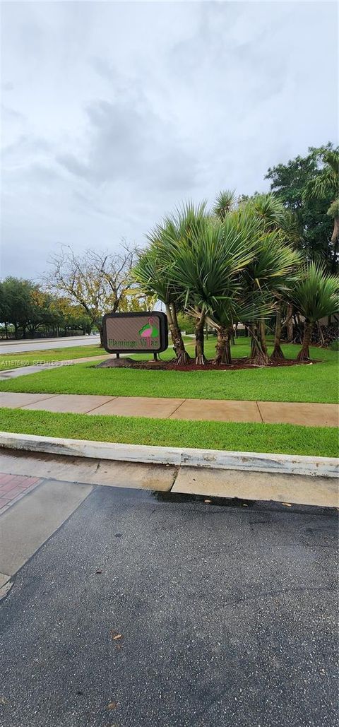 Photo of 12305 NW 11 Ct #12305, Pembroke Pines, FL 33026 (MLS # A11976400)