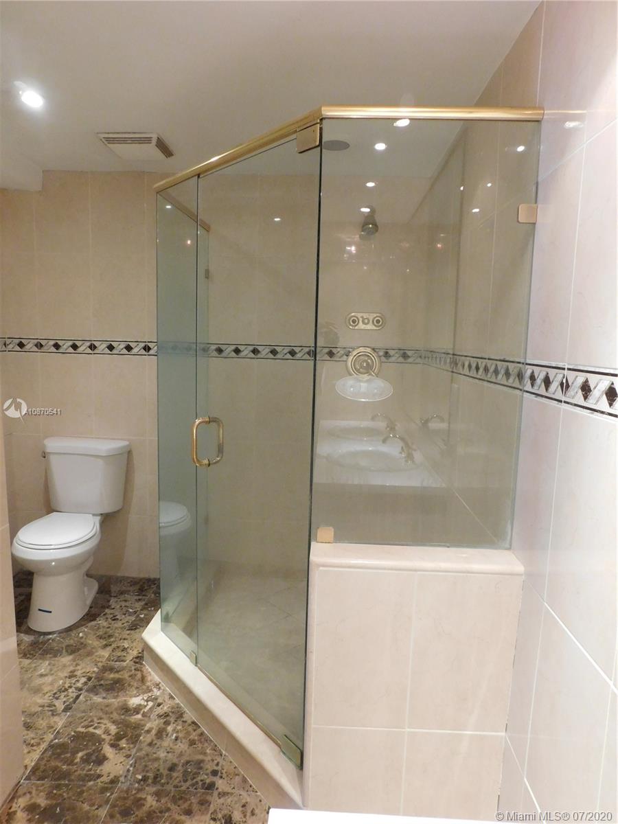 THE CARRIAGE HOUSE CONDO - Residential