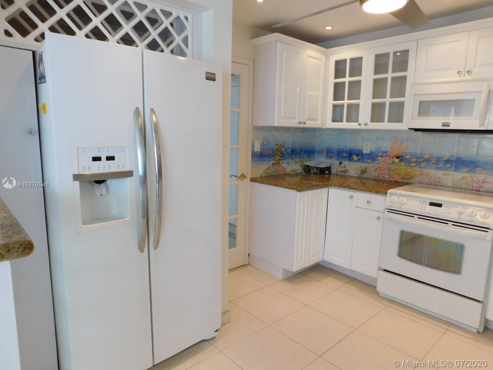 THE CARRIAGE HOUSE CONDO - Residential