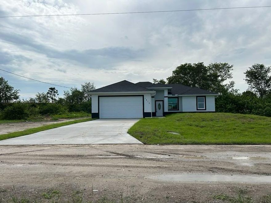 1/2 ACRE BRAND NEW HOME, GREAT LOCATION, CLOSE TO MAIN HIGHWAYS, I-75, SR-80, AND 10 MINUTES FROM SR-82. SPACIOUS, CLEAN, QUIET, NEW, THE PERFECT PLACE TO START A NEW FAMILY LIFE. TWO CAR GARAGE. MORE THAN ENOUGH SPACE IN THE PATIO FOR A POOL AND SO MUCH MORE! BEAUTIFUL LANAI THAT INVITES THE IMAGINATION FOR OUTSIDE RECREATION WTH FAMILY AND FRIENDS. DON'T WAIT, COME AND SEE IT TODAY. Estimated to be ready May 2023 or before. 1 Year Builder's Warranty. Pictures of a similar model.