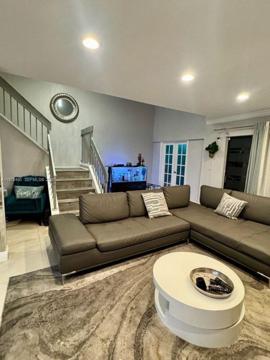 A wonderful opportunity to own this beautiful lake front townhouse! Located in the heart of Welleby, this 3 bedroom, 2.5 bathroom unit has it all! Granit countertops, stainless steal appliances, newer bathrooms, huge bedrooms, and an additional room down stairs that can be used as an office or an extra bedroom! Conveniently located near restaurants, shops, and schools! Move in ready and with low HOA fees! What more can you ask for?!