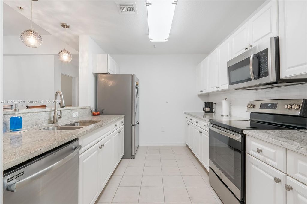 Photo of 1203 Town Center Dr #203, Jupiter, FL 33458 (MLS # A11363087)