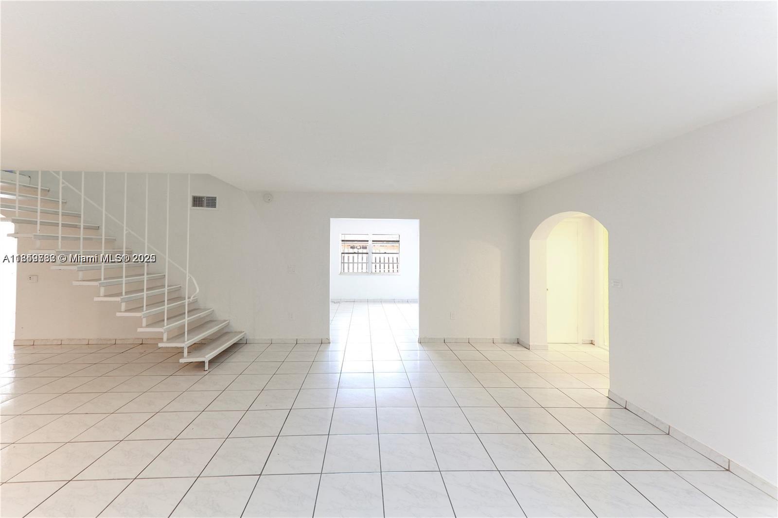 Spacious 4-bedroom, 2.5-bath unit available for immediate move-in! Features an open-concept layout with defined living and dining areas. Private laundry room in the home and a shared on-site laundry for your convenience. Centrally located in Miramar—steps from a grocery store, restaurants, and shopping centers. Professionally managed by Management Miami. Rapid approval process. Motivated owner is open to offers; updates may be considered with strong applications.