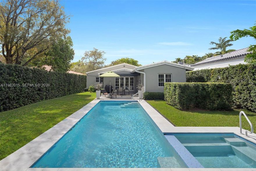 South Beach Deco Stunner! Renovated & ready residence set on an 8,000 Sq.Ft. lot. Minutes from the world-renowned Lincoln Road Mall, Convention Center, Sunset Harbour, New World Symphony, and Miami City Ballet. This home offers the perfect blend of tranquility & proximity to Miami Beach’s best dining, shopping, & entertainment, all in the coveted Palm View Neighborhood. Inside find soaring ceilings (almost 17' in great room) real wood French oak floors, & beautiful crown molding that highlight the home’s chic Art Deco character. The thoughtfully updated eat-in kitchen features Bosch appliances, blending modern convenience with timeless style. Boasting Sonos throughout, a custom built-in marble desk, & period skylight updated with impact glass. Enjoy a thoughtfully designed split floor-plan, where the spacious primary suite occupies a private rear wing of the home, roomy dual closets and direct access to the backyard. Outdoors, the fully gated & walled yard has a heated saltwater lap pool & jacuzzi, framed by a 10' hedge & lush landscaping for total privacy. A pergola & patio create an inviting space for outdoor entertaining. This easy-living one-story offers a separate laundry room, a garage with impact door and windows, with direct access from the garage to the kitchen, and a gorgeous fireplace. Your chance to enjoy an exceptional Miami Beach Lifestyle. This home is everything you're looking for, no headaches here!