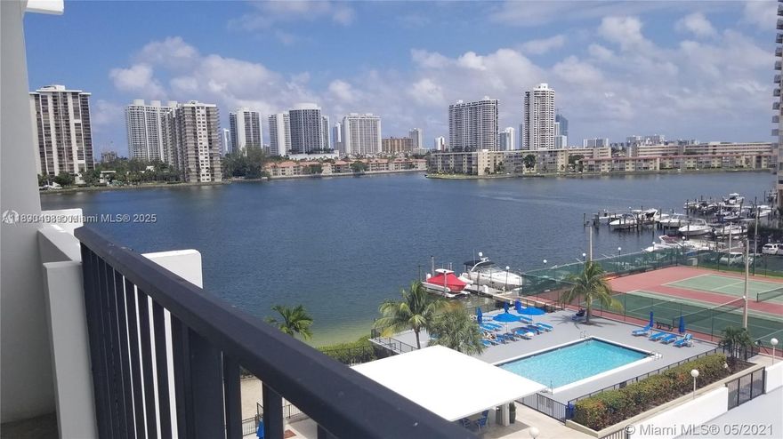 Gorgeous water view unit, oversized balcony. New custom kitchen w/quartz counter top, trendy back-splash & stainless steel appliances. Bathrooms also been renovated, brand-new AC, lots of storage. Assigned covered parking space included! Laundry a few feet from your door. This full service gated building is located close to shops, malls, restaurants, parks, hospitals, Brightline train, banks, etc. Building Amenities includes: cable, high speed internet, Wi-Fi, shuttle transportation, 24-hour concierge desk, 24-hour parking surveillance, 2 fitness rooms, sauna, tennis courts, bike storage, party room, marina, dock, areas for BBQ & car wash, Pest Control included bimonthly. 1 yr. min. rental.