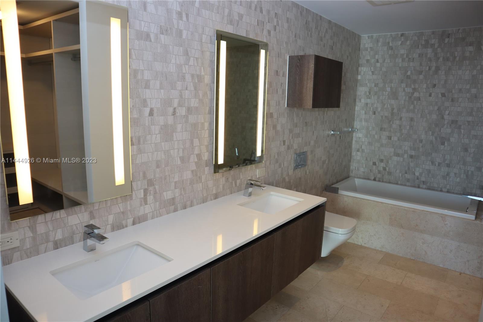 REACH AT BRICKELL CITY - Residential Lease