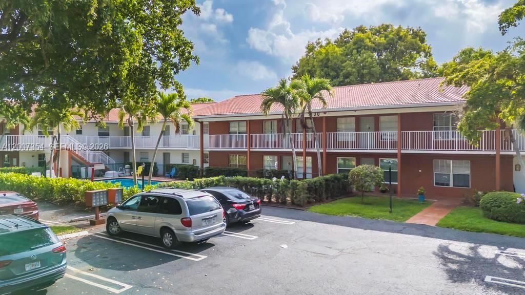 Photo of 3100 Coral Springs Dr #2H, Coral Springs, FL 33065 (MLS # A12007354)