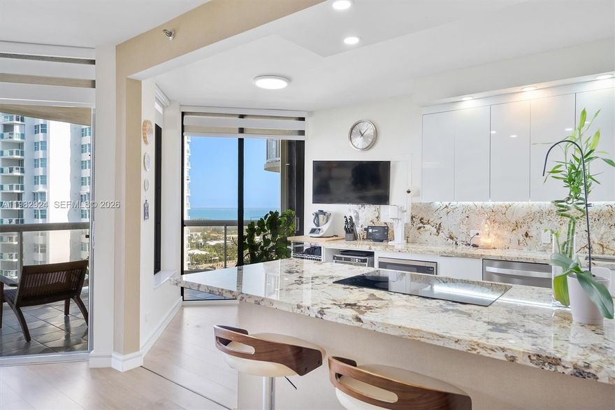 Opportunity is calling—step into this high-floor gem with breathtaking views of the Intracoastal Waterway and lush golf courses, where every day begins with a stunning sunrise and ends with a spectacular sunset.

This expansive 1,622 sq. ft. condo boasts a thoughtfully designed split floor plan, offering 2 spacious bedrooms and 2 beautifully updated bathrooms. The completely remodeled kitchen, featuring modern finishes, opens seamlessly to the living area, making it perfect for both relaxing and entertaining. Luxury vinyl flooring adds warmth and style, while custom-built closets provide smart storage solutions. LED recessed lighting, smooth ceilings, and a brand-new A/C (installed in 2025) complete this impeccably maintained space.

Convenience is key here, with assigned parking for one vehicle and a second spot available. Nestled within a full-amenity waterfront building along Aventura's iconic Country Club Drive, you'll enjoy a lifestyle of comfort and sophistication.

Lovingly cared for by its current owners, this home is ready for you to move in and make it your own. Don’t let this opportunity pass you by!