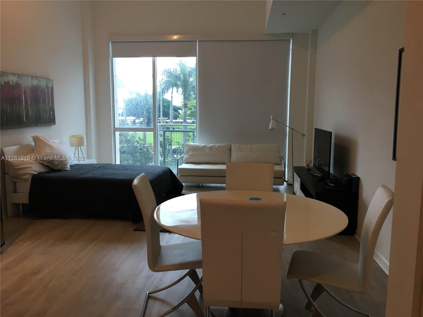 Beautiful furnished studio at Vizcayne Condominium and facing Biscayne Blvd. Double height ceilings, granite countertops, stainless steel appliances, washer and dryer inside the unit. Very well equipped, furniture includes: 1 double bed + 1 sofa bed for eventual guests. Nicely decorated and located in an excellent area, walking distance to American Airlines Arena, Museums, Miami Dade College and metro mover just steps away. The building has very complete amenities, wonderful pool area (4 pools), jacuzzi, sauna, gym, lounge, business center, spa.