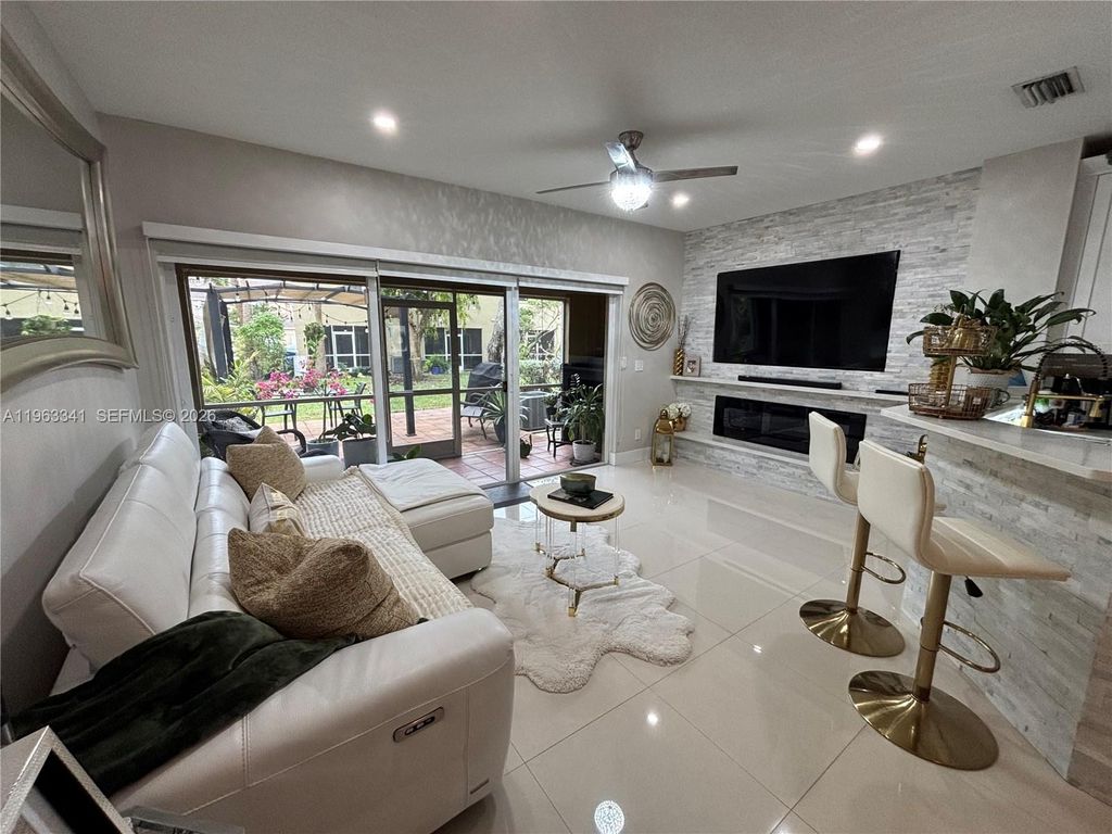 Photo of 341 SW 121st Ave, Pembroke Pines, FL 33025 (MLS # A11963341)