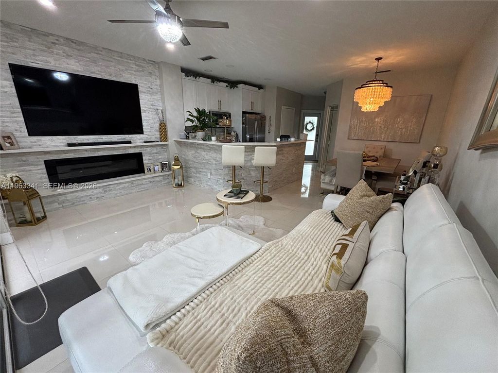 Photo of 341 SW 121st Ave, Pembroke Pines, FL 33025 (MLS # A11963341)