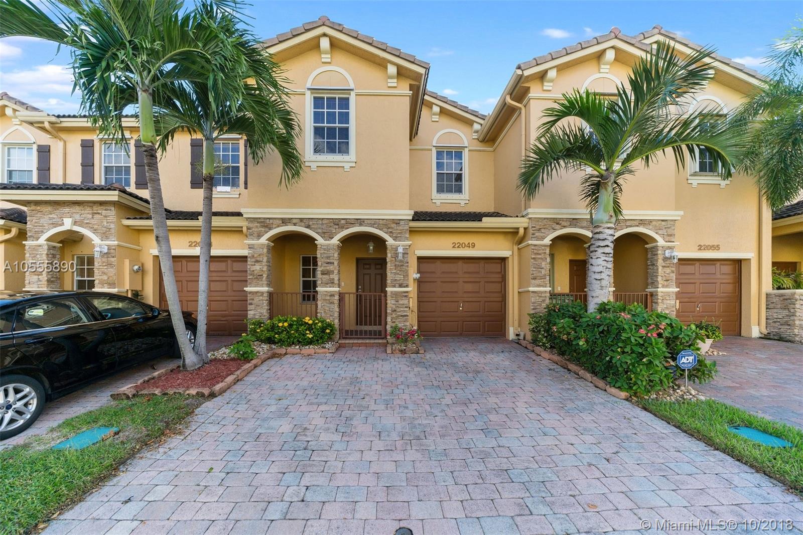 Beautifully updated in modern style, waterfront unit at Isles of Bayshore. Beautiful plank tile floors in living areas, eat in kitchen w/quartz countertops and stainless steel appliances. One full bath downstairs, 3 spacious bedrooms and 2 baths upstairs. Private paver patio overlooks lake. 1 car garage. Move in condition!