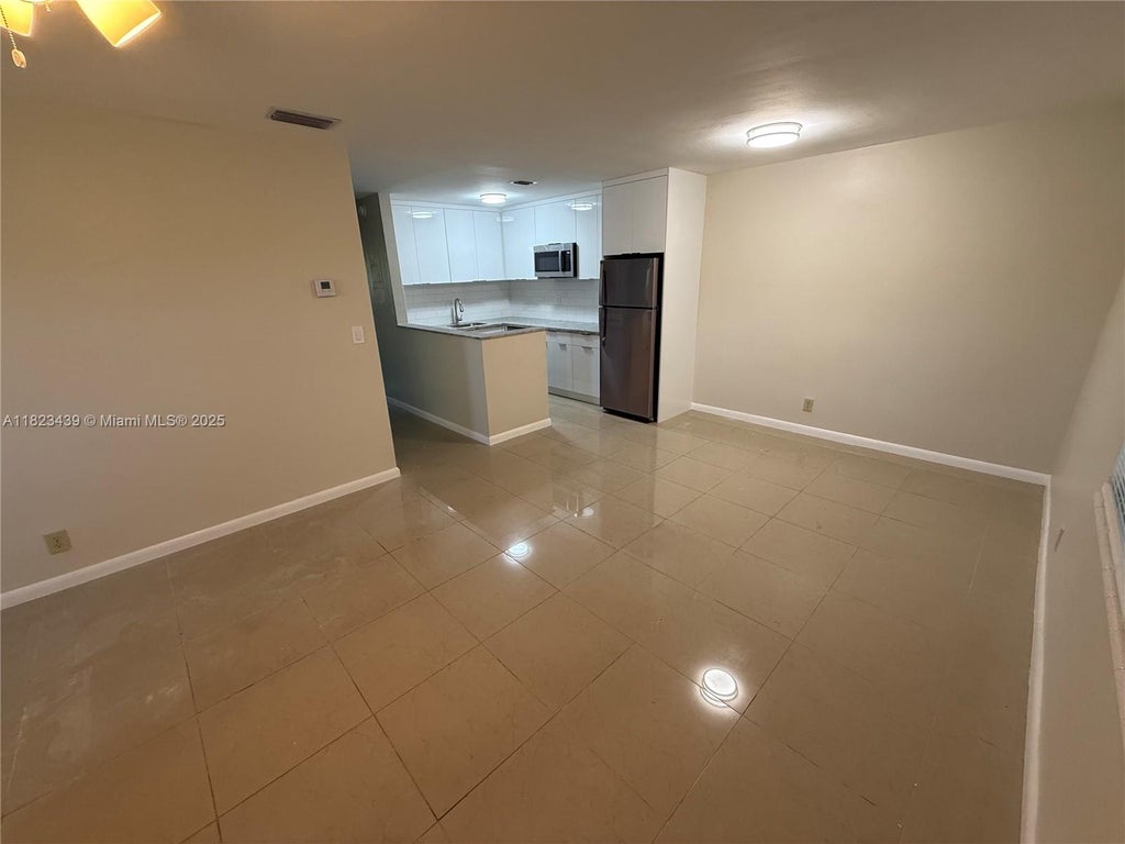 Photo of 1017 SE 22nd Ave #207, Pompano Beach, FL 33062 (MLS # A11823439)