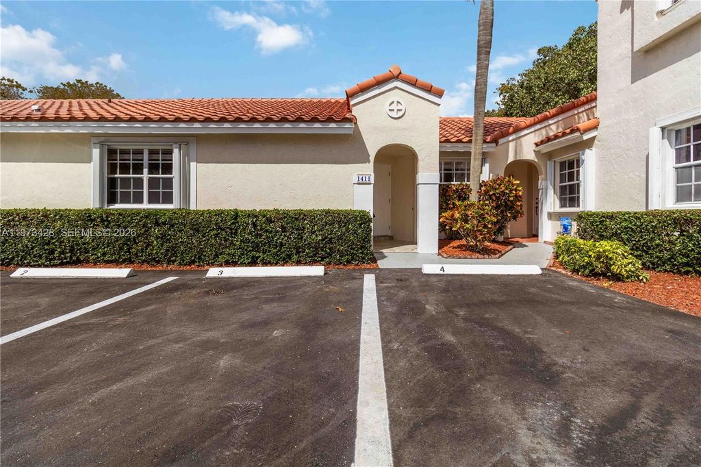 Photo of 1411 Cottonwood Cir, Weston, FL 33326 (MLS # A11973428)