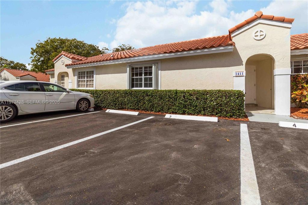 Photo of 1411 Cottonwood Cir, Weston, FL 33326 (MLS # A11973428)