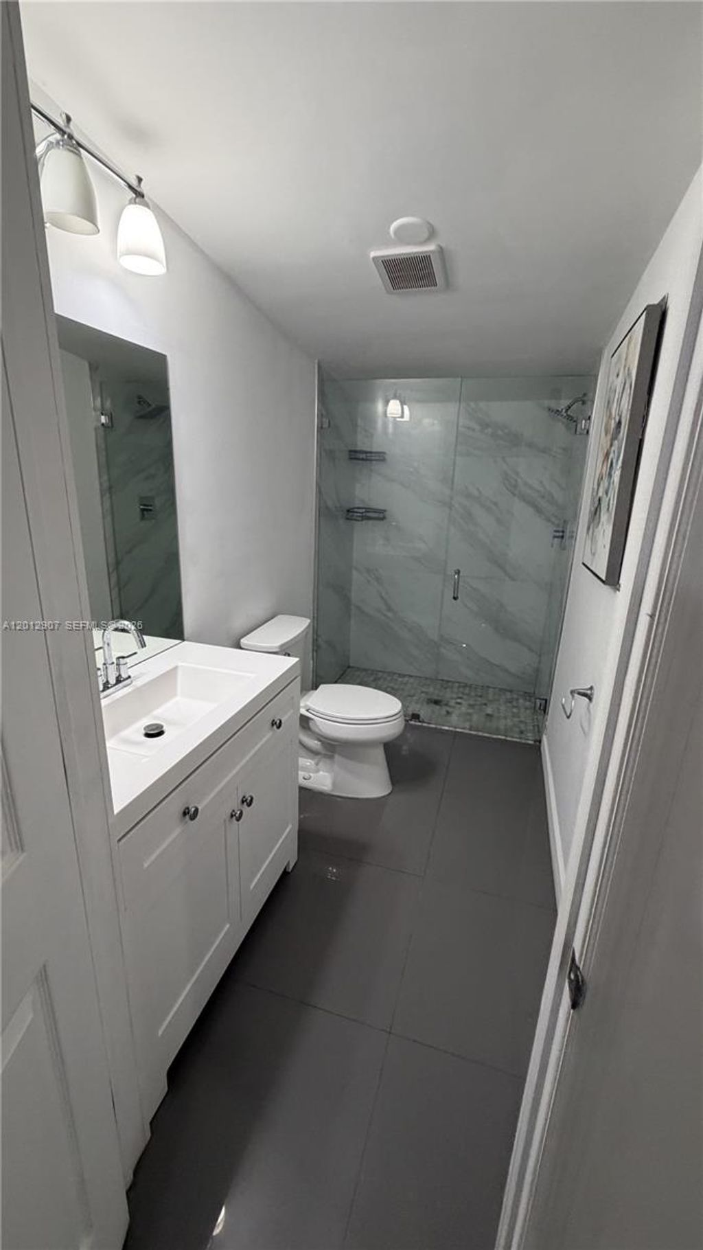 Photo of 1212 E River Dr #2, Margate, FL 33063 (MLS # A12012907)