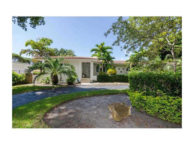 Spacious and modern 3BED/2BA in Miami Shores! Located East of Biscayne Blvd in a quiet secluded area. Open the door of your new home to a foyer, marble floors in living areas, wood floors in bedrooms. Enjoy high end marble baths, a remodeled kitchen w/mar ble counters & wooden cabinetry as well as a built in wine cooler! You'll also find a large 2 car garage+washer dryer. Lush, private backyard w/fruit trees. Must have a min score of 600. Tenant pays for electric, water and lawn maintenance. Dogs -25lbs ok