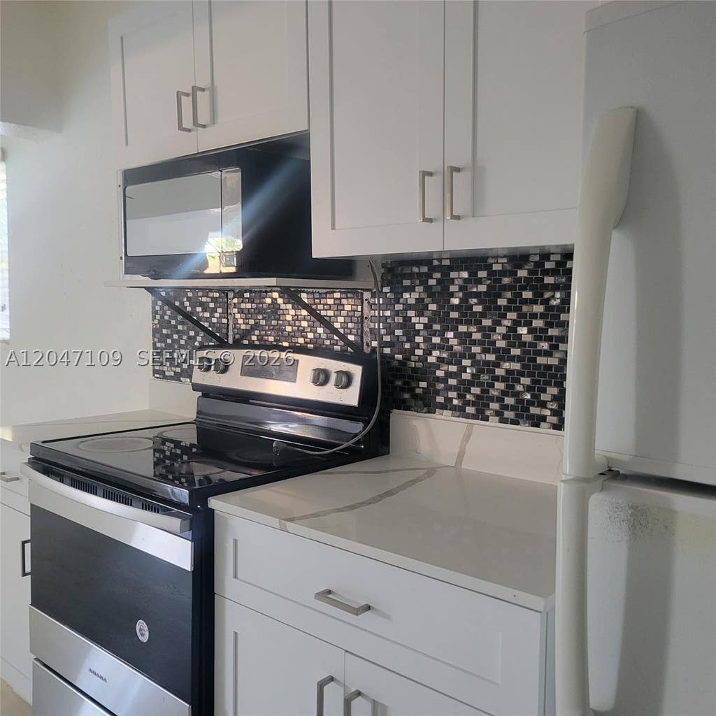 Photo of 715 SW 6th St #1-2, Dania Beach, FL 33004 (MLS # A12047109)