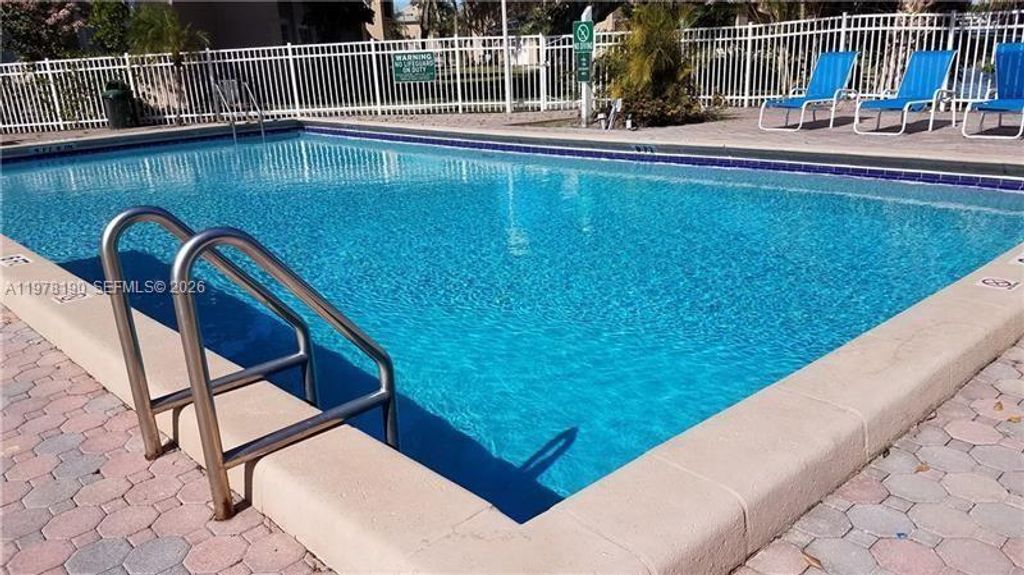 Photo of 1701 NW 96th Ter #1E, Pembroke Pines, FL 33024 (MLS # A11978190)