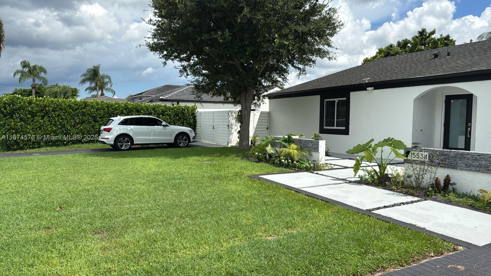 Spacious, updated 1/1 with parking and washer/dryer in unit. All utilities included. Private entrance. Centrally located in a nice residential.