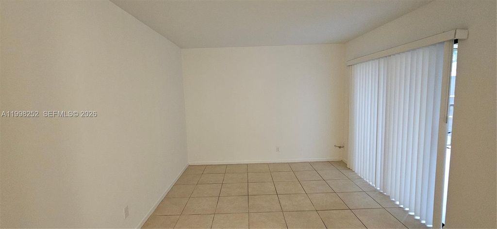 Photo of 3396 Foxcroft Rd #310, Miramar, FL 33025 (MLS # A11998252)