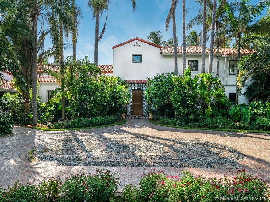 Located on an oversized half acre with 130 ft of water frontage on Miami Beach’s prized Meridian Ave. This 5,941 sf Mediterranean estate has been restored and updated, featuring 7 bed, 6 baths.  One of Russel Pancoast’s most important homes showcasing Old-World charm upon arrival at a double height ceiling foyer leading to the living room with fireplace and Pecky Wood vaulted ceilings. Master suite with balcony overlook the pool, pergola and dock with new seawall, boat and jet ski lifts and ocean access.  Updated gourmet kitchen with breakfast area and Wolfe appliances. Media room, Study, and Gym.  Walking distance to Houses of Worship, shops and schools.  Formal dining with warm natural light. Separate service quarters included. Minutes from West Ave Corridor and new Ritz residences.