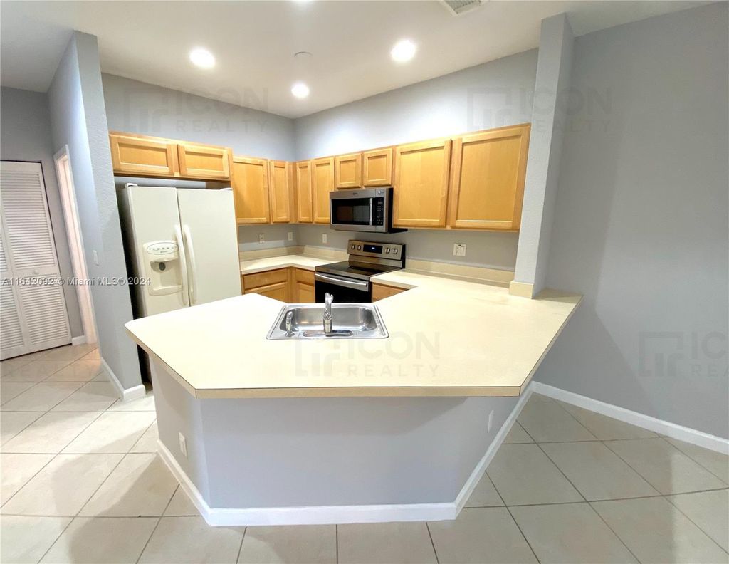 Photo of 4545 Highgate Dr #A, Delray Beach, FL 33445 (MLS # A11642092)