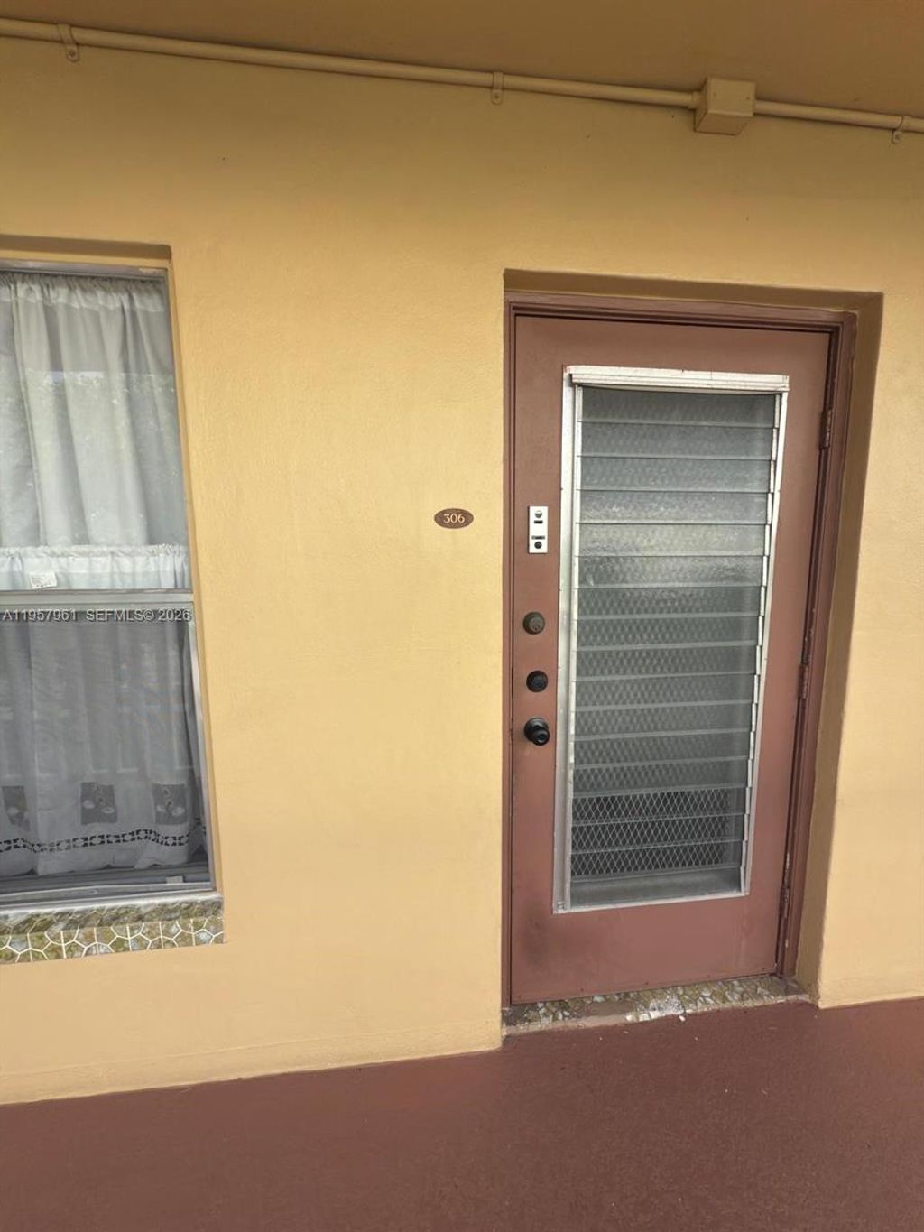 Photo of 5800 NW 64th Ave #306, Tamarac, FL 33319 (MLS # A11957961)