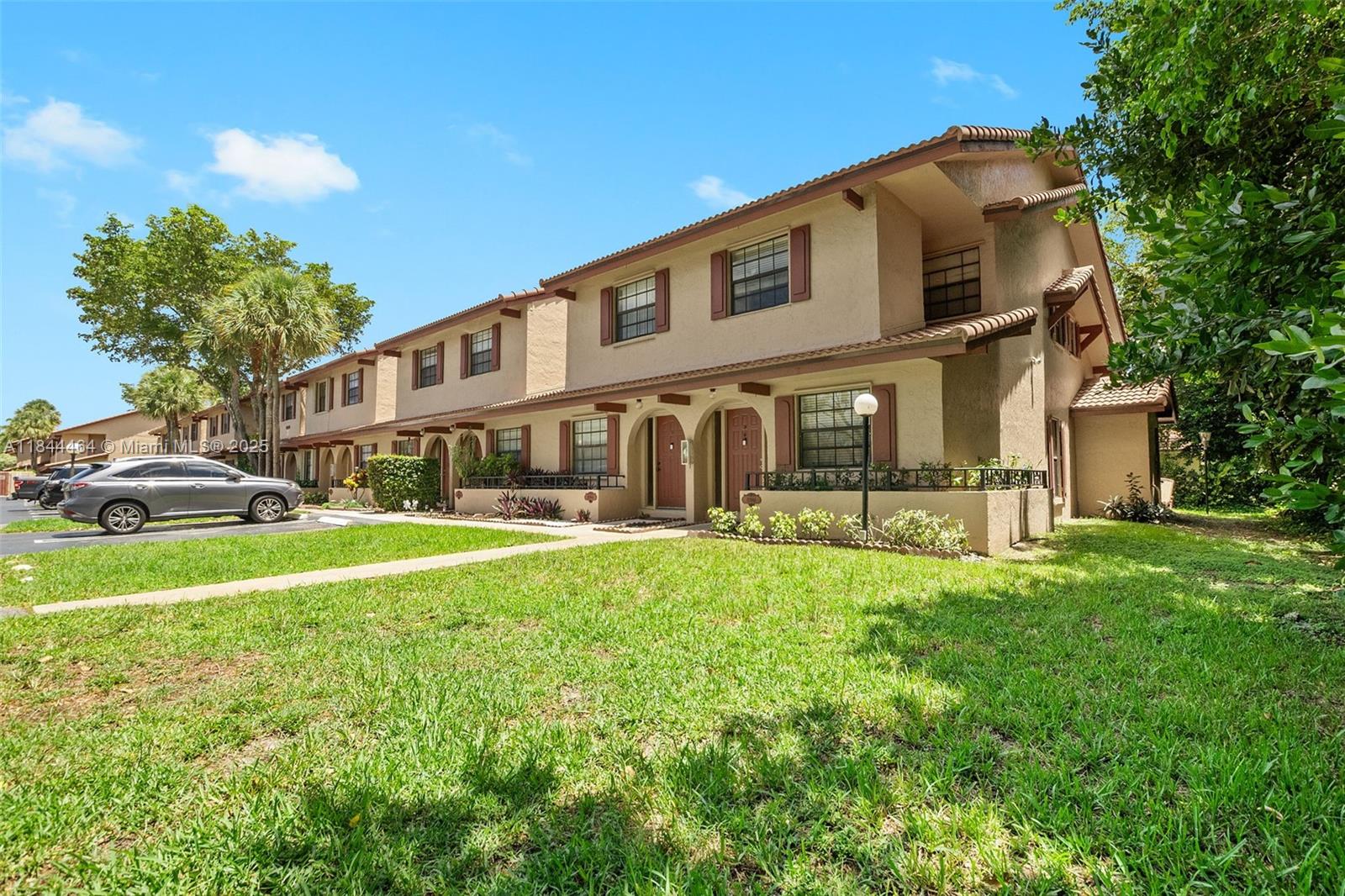 Lovely corner unit townhome in central location of Coral Springs. Close to shops, restaurants, and The Walk. Nice bright and open living area. Large kitchen with plenty of cabinet and counter space featuring stainless steel appliances. Full size washer and dryer. Large screened in patio with extra storage room along with back yard space perfect for BBQs and relaxing. Large primary bedroom with double closets. Nice and clean home ready to make it you own! Don't miss this great opportunity to own a 3 bedroom corner townhome in Coral Springs.