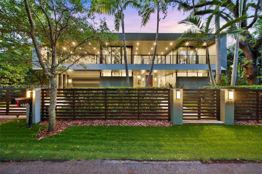 Stunning Coconut Grove residence showcasing soaring ceilings and an abundance of natural light. Meticulously designed with superior finishes and top-of-the-line appliances, this elegant home offers a spacious and functional layout. The main level offers two bedrooms, a private movie theater, expansive living and dining areas, and fully retractable doors that seamlessly blend indoor and outdoor living. The upper level features four additional bedrooms, including a lavish primary suite complete with oversized dual walk-in closets and an impeccably appointed spa-like bath. A secondary living area thoughtfully separates the primary suite from the three additional en suite bedrooms. The beautifully landscaped backyard creates a serene, private oasis with a resort-style pool framed by lush bamboo for ultimate privacy. Additional highlights include a two-car garage plus a two-car carport, the home runs on solar panels with no electric bill, and two electric vehicle charging stations. Ideally located steps away from Kennedy Park and a short stroll to the heart of Coconut Grove, this fully gated home sits on a quiet street with ample parking. This property truly embodies the best of Miami living.