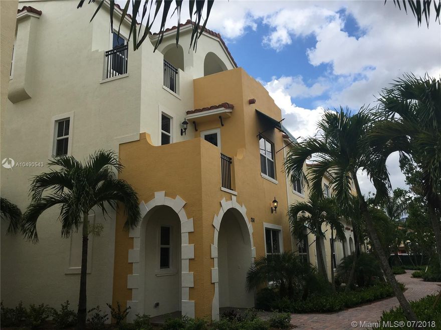 Be the FIRST to live in this BRAND NEW TRI-LEVEL Corner Town home in the centrally located NEW CENTRA FALLS WEST Community in Pembroke Pines. This 4 Bedroom/3.5 Bath/2 car garage is move in ready NOW!!  Up-graded Contemporary Kitchen with stainless steel appliances, white Quartz Counter-tops, 2400 sq. ft living space, all tile floors except carpeted stairs. Master Bedroom with balcony on 2nd floor,  washer & dryer in laundry room & 2 more Bedrooms and Full Bath.  The 3rd Level is a real SURPRISE with kitchenette including microwave & small refrigerator, loft area, 4th bedroom, full bath and bonus large balcony.  Use your imagination with this incredible 3rd floor space.  Save money with Impact Windows & Energy Saving Features. Guard Gate, Alarm,  Community Pool & Fitness Center.  Call me!!