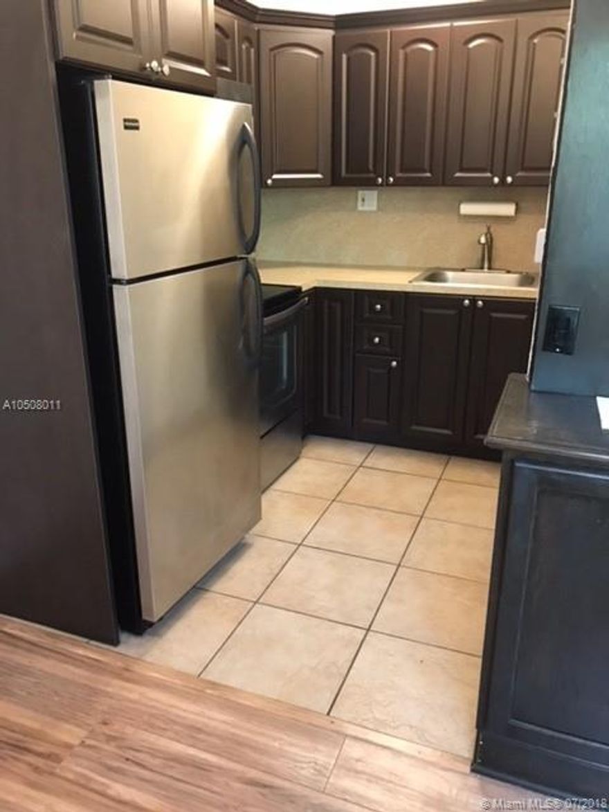 Location Location Location!!! Spacious 1 bedroom 1 bath condo. Unit is updated. Has wood and tile floors, stainless steel appliances and Impact Windows.
