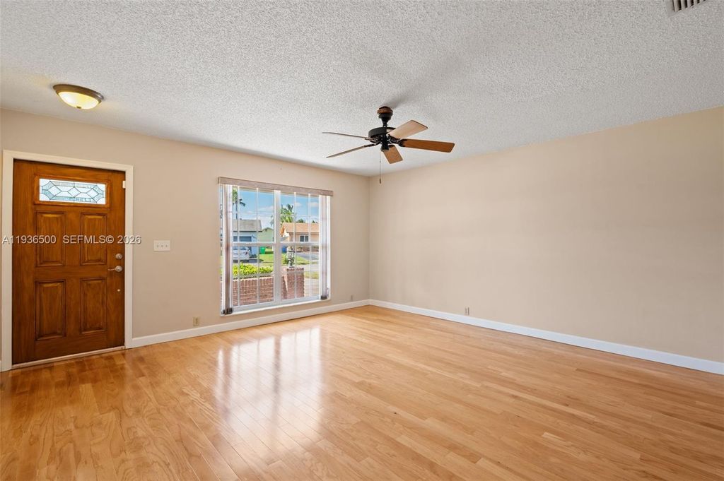 Photo of 2324 NW 107th Ter, Sunrise, FL 33322 (MLS # A11936500)