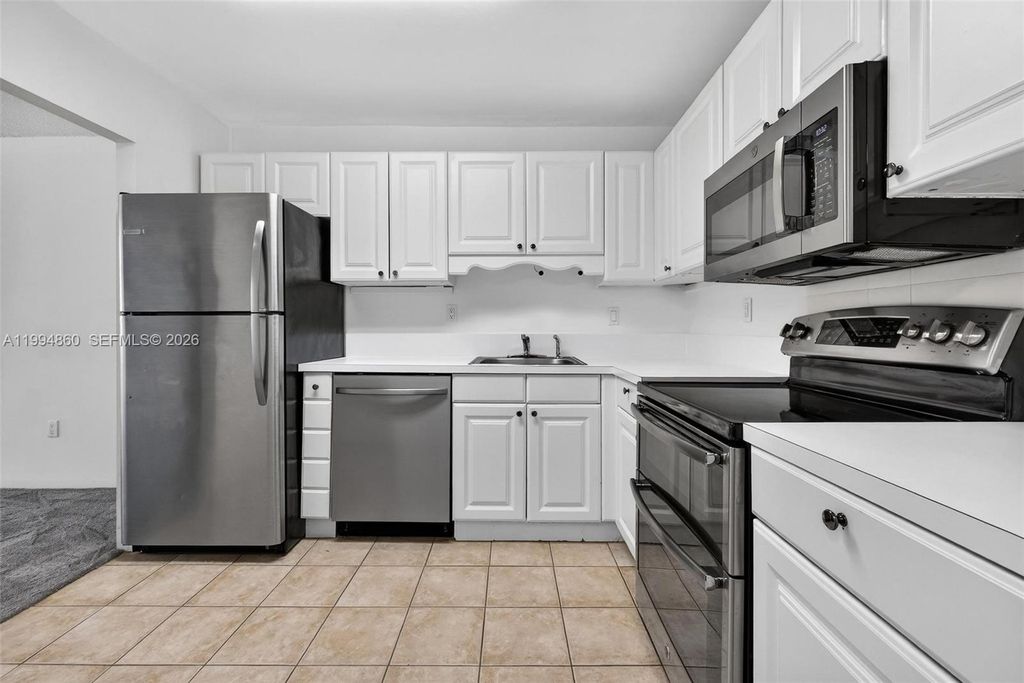 Photo of 1400 Saint Charles Pl #222, Pembroke Pines, FL 33026 (MLS # A11994860)