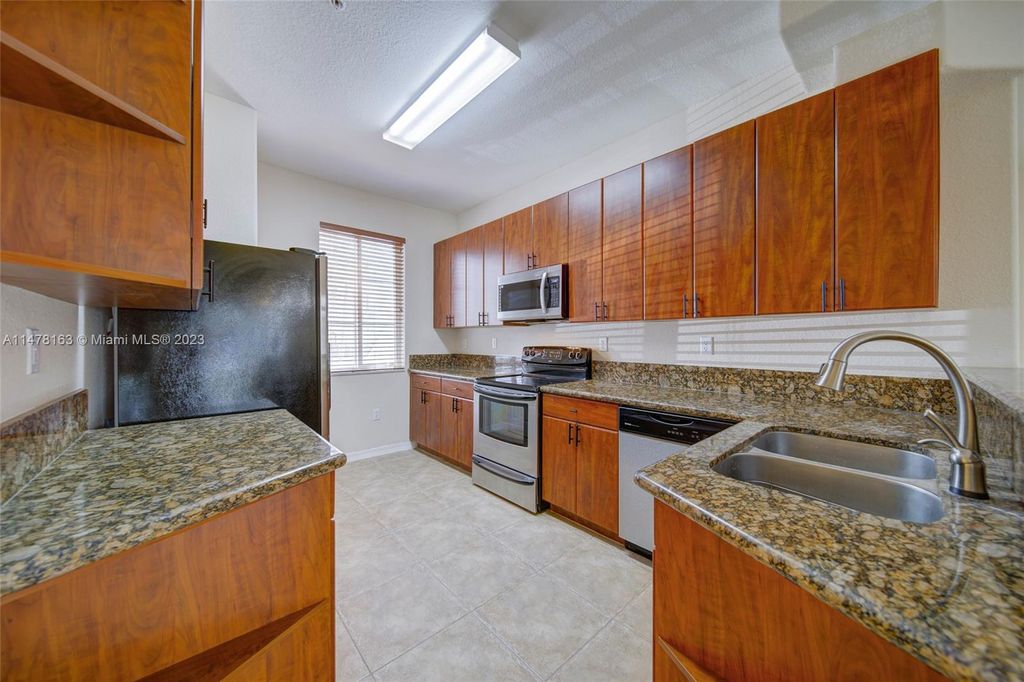 Photo of 12421 SW 50th Ct #309, Miramar, FL 33027 (MLS # A11478163)