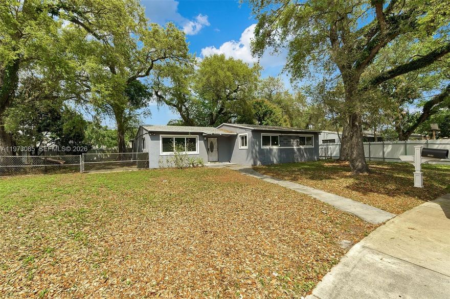 Situated on an oversized 12,000 sq ft lot, this well-maintained 3-bedroom, 1.5-bath home offers 1,614 sq ft of living space and incredible potential. All major upgrades have been completed within the last 2 years, including a new roof, impact windows and doors, and a new HVAC system—providing peace of mind for years to come. The spacious, fully fenced yard offers plenty of room for outdoor entertaining or the addition of a pool. Easily convertible to a 3/2 layout, this home is ideal for both homeowners and investors. Conveniently located near major highways, schools, shopping, and dining.